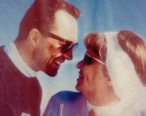 couple smilling and posing for the photo